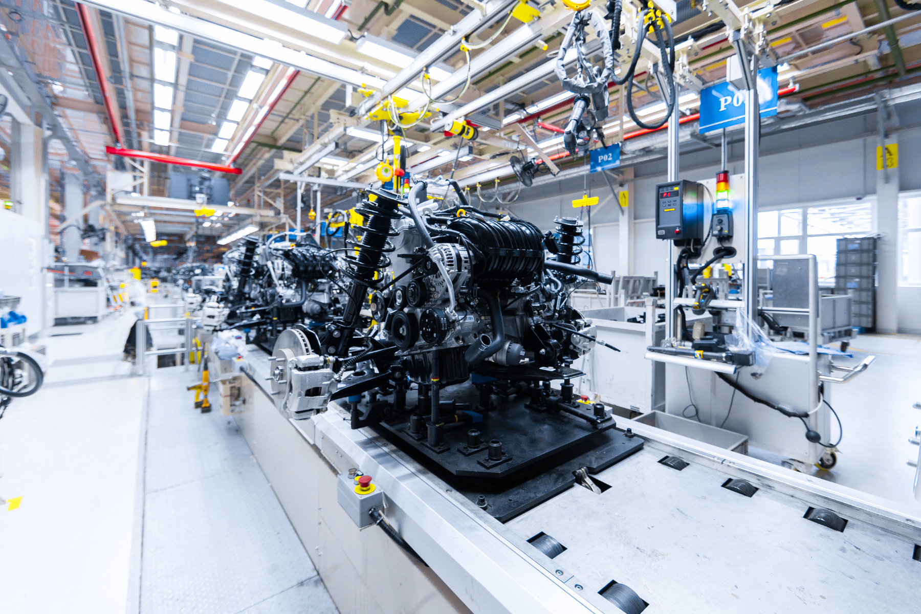 advanced manufacturing Automated manufacturing facility with robotics and production lines, showcasing SBA 504 loan support for equipment and technology upgrades.