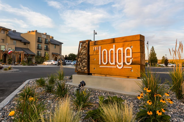 the lodge columbia point sign